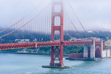 Golden Gate Bridge in clouds on a beautiful summer day  - Panoramic view from Battery Spencer - California, USA