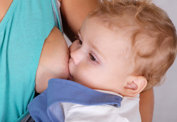 breastfeeding boy European appearance