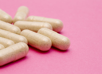 Pills on a Pink Background