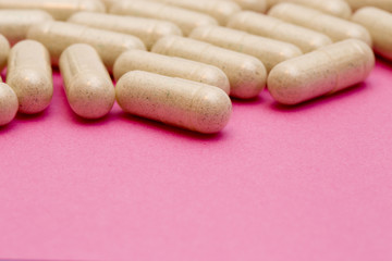 Pills on a Pink Background