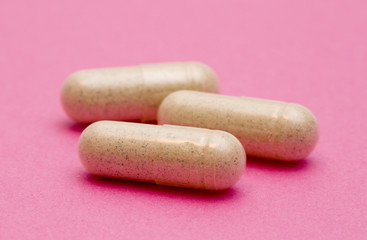 Pills on a Pink Background