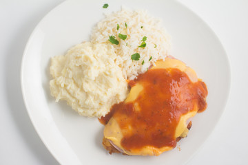 Chicken Fillet with rice and Mushed Potatoes. Parmegiana Fillet