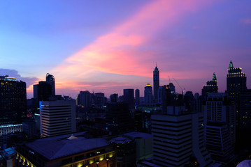 Fototapeta na wymiar Cityscape with sunset and skyline in the evening at Bangkok Thailand.