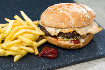 Cheese burger - American cheese burger with Golden French fries