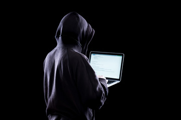 Anonymous hacker in the dark