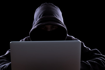 Anonymous hacker in the dark