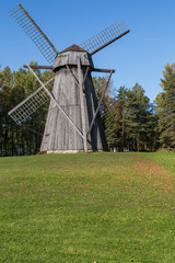 Obraz premium Wooden Windmill in the Willage