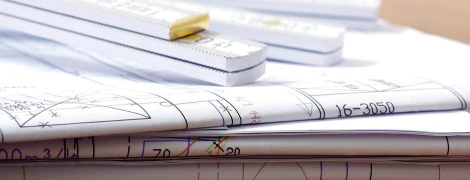 Plan mit Zollstock, Architekt