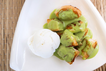 Toast bread with green custard topping.