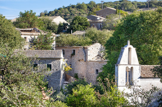 Old Perithia, Corfu's oldest village, incredible ruins of stone build houses, close to Mount Pantokrator, abandoned village of Sinies. Greece.