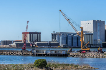 Crane giraffe on the pier, decoration equipment, sunny day, Kalmar, Sweden. © bzzup