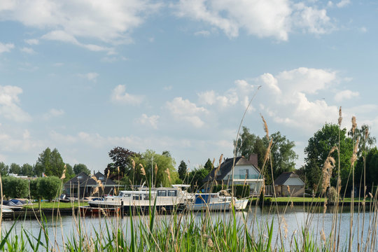 Boats and Houses in Zwartsluis, near the Weerribben-Wieden National Park, near Giethoorn, Netherlands