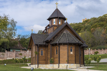 Fototapeta na wymiar a small wooden Orthodox church