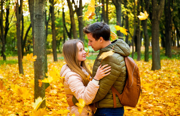 Couple in love in the autumn forest
