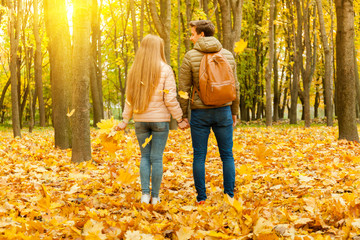 Naklejka premium Couple in love in the autumn forest