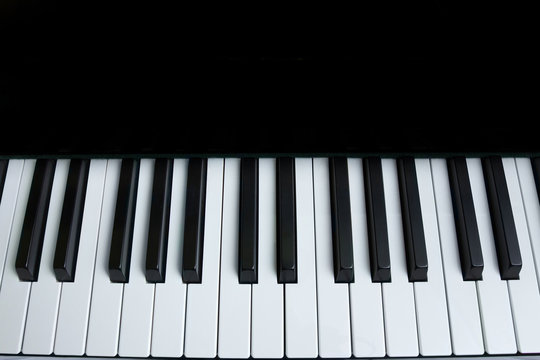 Piano keyboard. Top view, flat lay. Background with copy space
