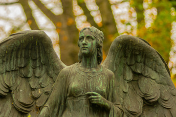 Fototapeta na wymiar Angel Sculpture on Graveyard