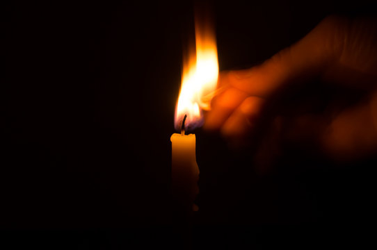 Candle light on dark background