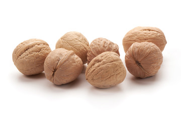 Walnuts close-up, isolated on white background