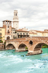 Fototapeta na wymiar Verona. Bridge Ponte Pietra in Verona on Adige river.