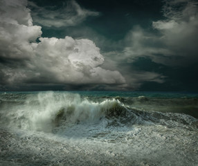 View of great storm on the sea. Strong wind and big waves with s