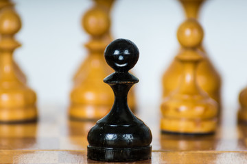Simple old chess pieces - pawn with a smile