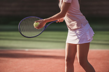 Fototapeta na wymiar Girl playing tennis