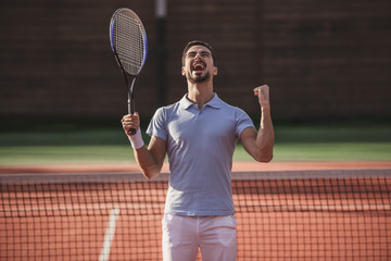 Man playing tennis