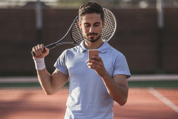 Man playing tennis © georgerudy