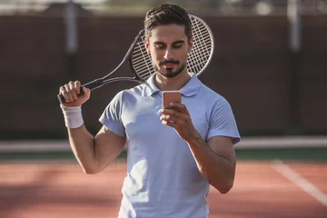  Man playing tennis © georgerudy