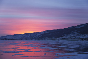 Lake Baikal, winter. Cape Uyuga sunset landscape.