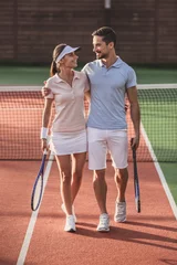 Foto op Canvas Couple playing tennis © georgerudy