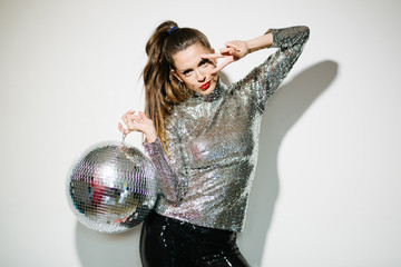 Woman with disco ball 