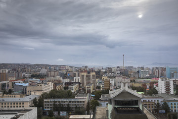 Fototapeta na wymiar city of Ulaanbaatar, Mongolia, with a cloudy sky over it 