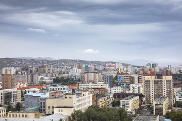 Fototapeta na wymiar city of Ulaanbaatar, Mongolia, with a cloudy sky over it 