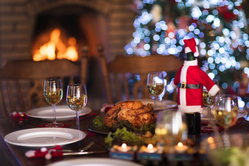 Christmas dinner at fire place and Xmas tree.