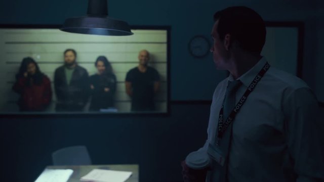  Detectives discussing line up of suspicious characters at police station