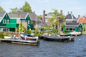Fototapeta na wymiar Houses on the channel in Zaandam, near Zaanse Schans,Netherlands