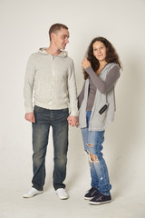 Young couple on a white background