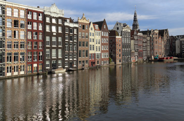Historical houses on a canal in Amsterdam, Holland