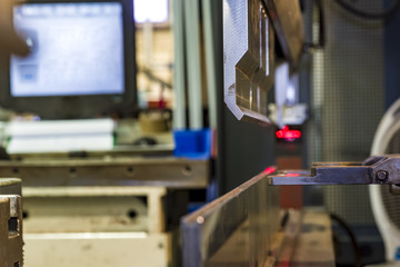 Bending of metal on the machine.