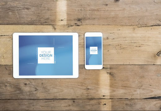 Tablet and Smartphone on Wooden Table