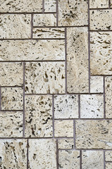 New ecru travertine wall closeup