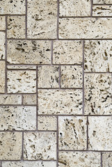 New ecru travertine wall closeup