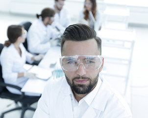 scientist microbiologist in the laboratory background.