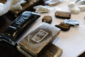 Blocks/bricks of cannabis resin  on display after being seized by the police