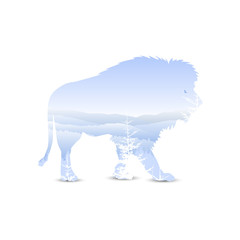 Silhouette of lion with panorama of mountains.  Winter.