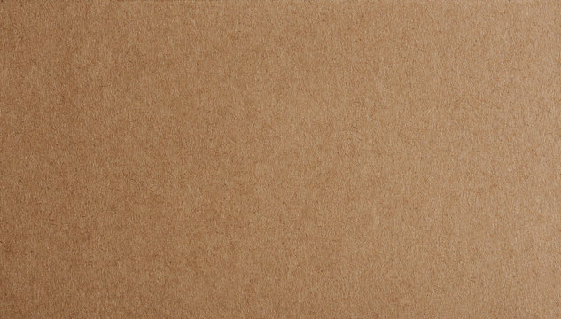 Flat brown paper background closeup