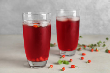 Glasses with goji juice on table