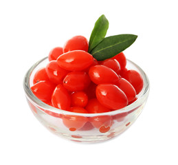 Bowl with goji berries on white background